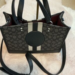 COACH Black Monogram 3 Way Bag.